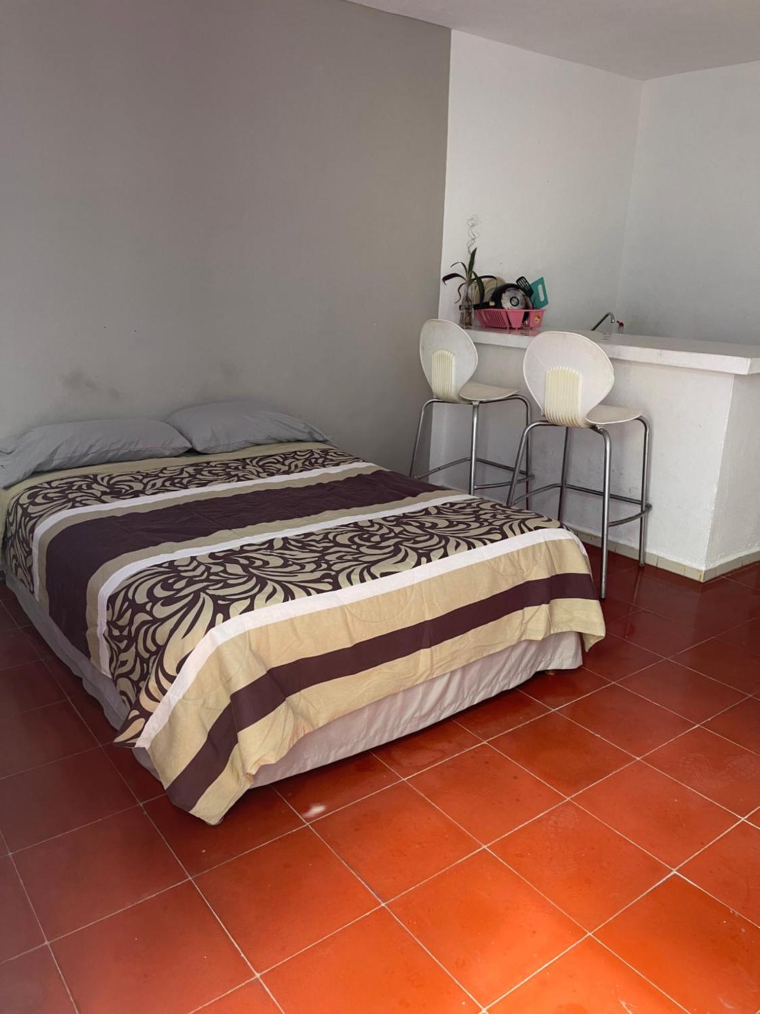 Apartamentos Cupules Merida Bagian luar foto